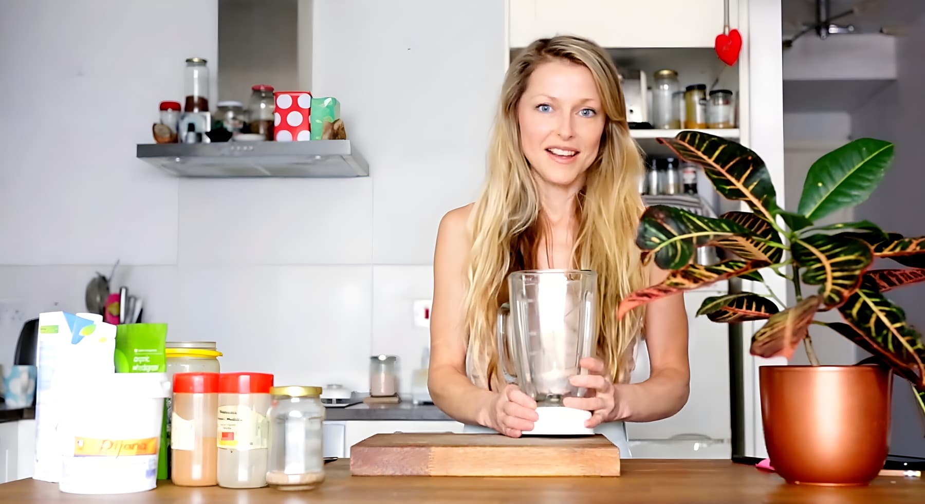 Claire Louise Foster at her kitchen counter with a blender